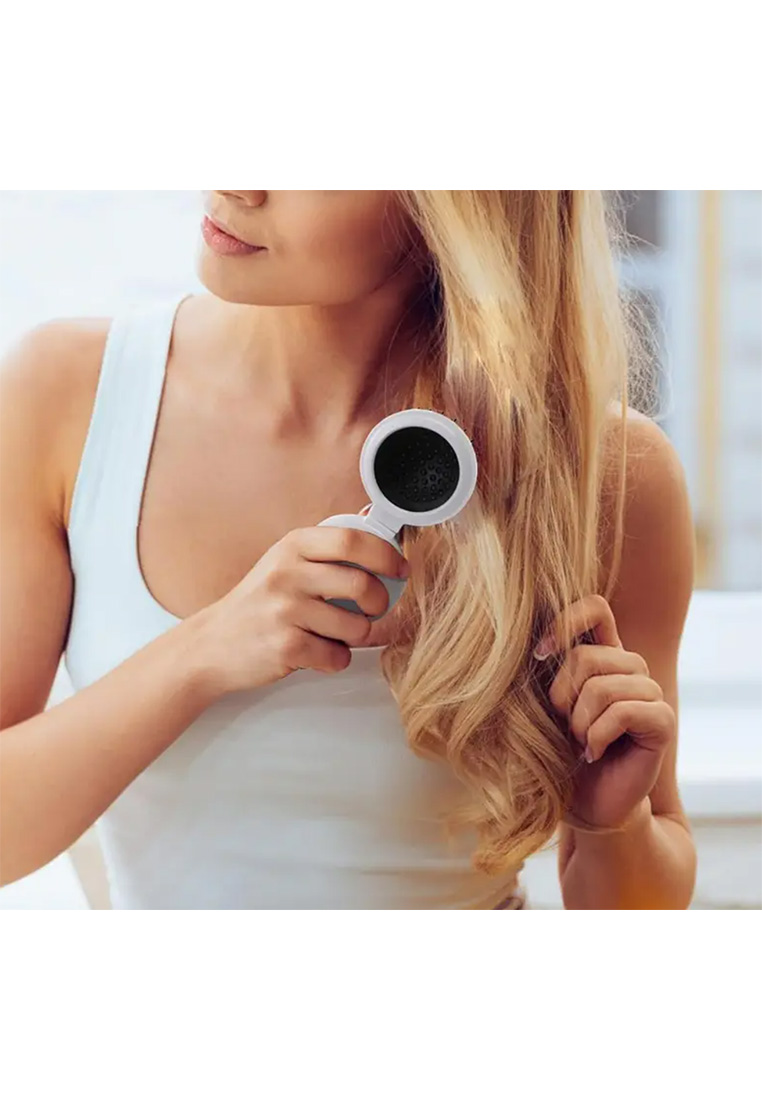 Schmuckzauber faltbare Reisehaarbürste mit Spiegel, Frontansicht in Weiß, mit einer integrierten schwarzen Bürstenfläche.