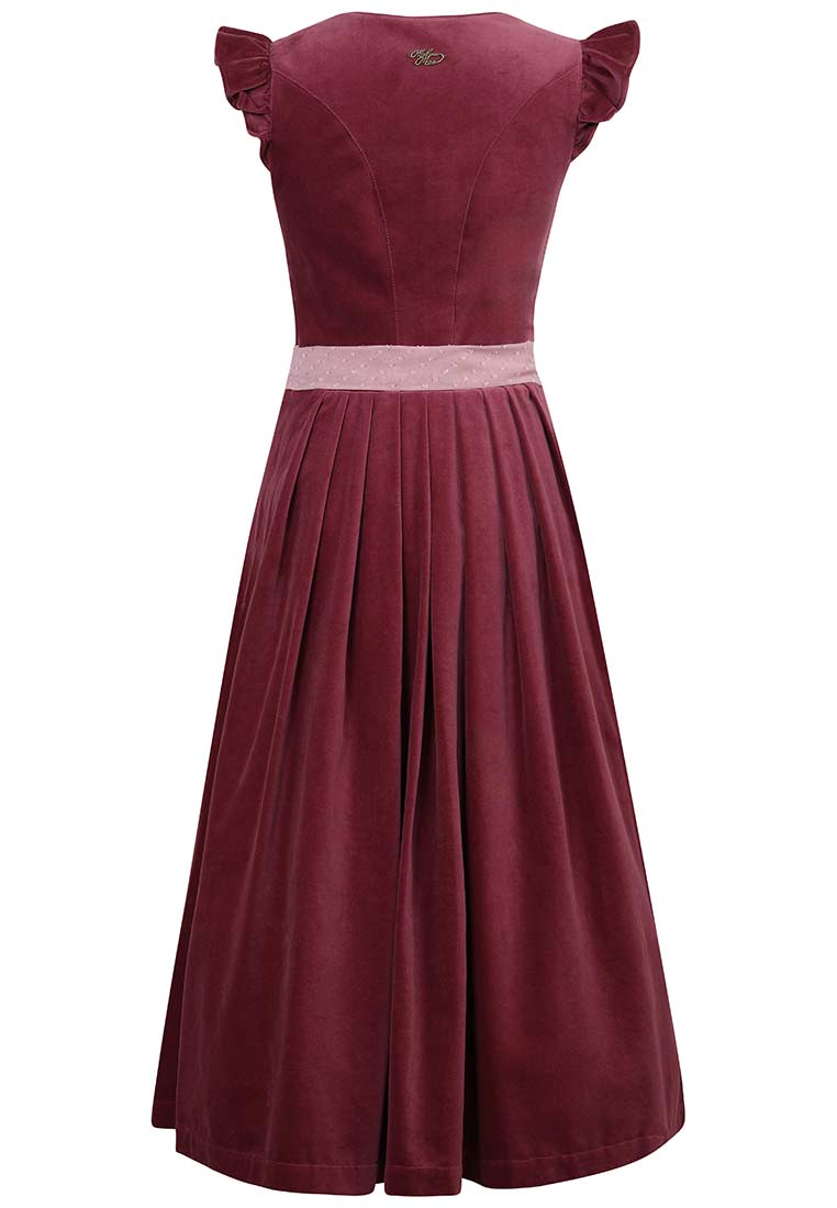 Madame Marie Dirndl Soralyn Samt pflaume (borderaux) 65 cm, Rückansicht. Dieses elegante Dirndl in Bordeaux aus Samt verfügt über eine schmale, gepunktete Schürze und einen ausgestellten Rock mit Falten.