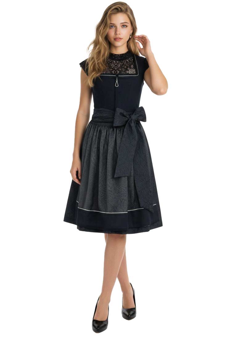 Bergweiss Dirndlbluse Sari, dunkelblau, Frontansicht einer Frau mit Reißverschluss und rüschenbesetztem Kragen.