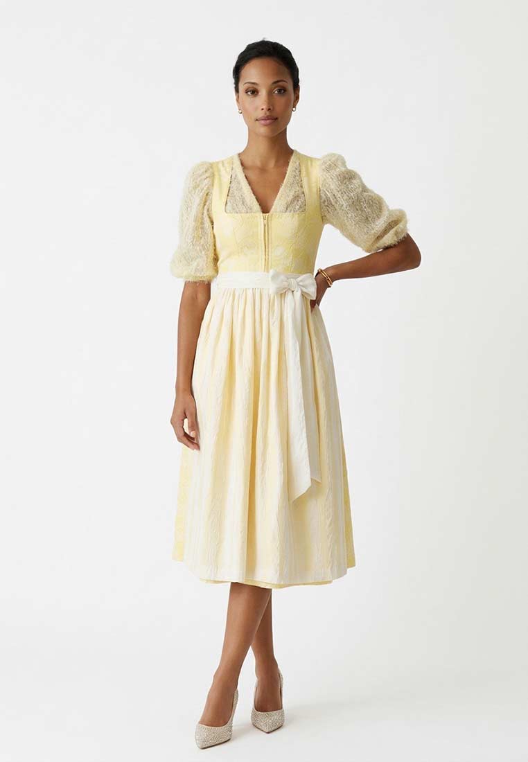 Tamaris Dirndl Pumps Pearl Glam in Hellgelb. Damen-Pumps mit glitzernder Oberfläche und spitzer Zehenpartie in Frontansicht.