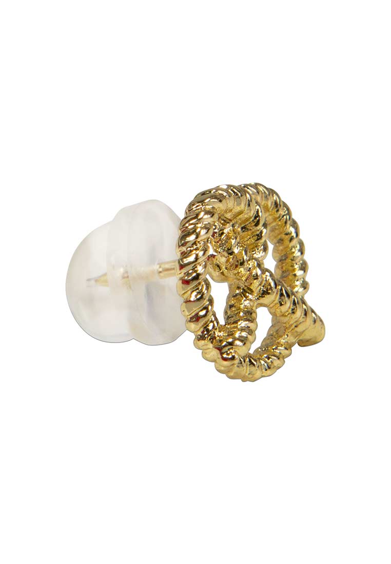 Alpenflüstern Ansteck Pin Breze gold, Frontansicht des Ansteckpins mit verschlungenem Design und goldener Farbe. Das Schmuckstück hat eine klare Form.